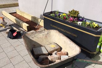 DePave: paving stones removed for raised beds at Hollinswood Neighbourhood Centre