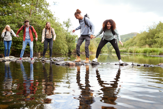 Friends on a walk - Shutterstock