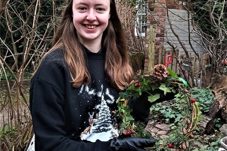 Josie with a wreath that she made at The Cut Shrewsbury