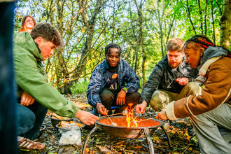Young people around fire