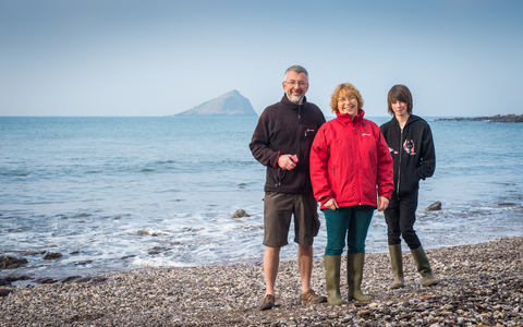 Paul and his family on the beach