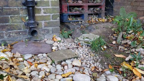 DePave: a pebble & cobble drain swale