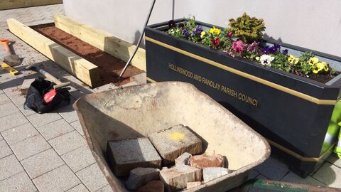 DePave: paving stones removed for raised beds at Hollinswood Neighbourhood Centre