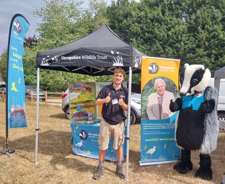 Ben, a membership recruiter, at a stall