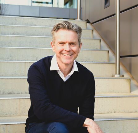 Headshot of Neil Daly