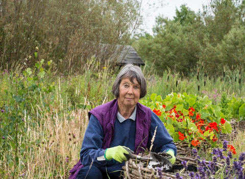 Carol gardening as a volunteer